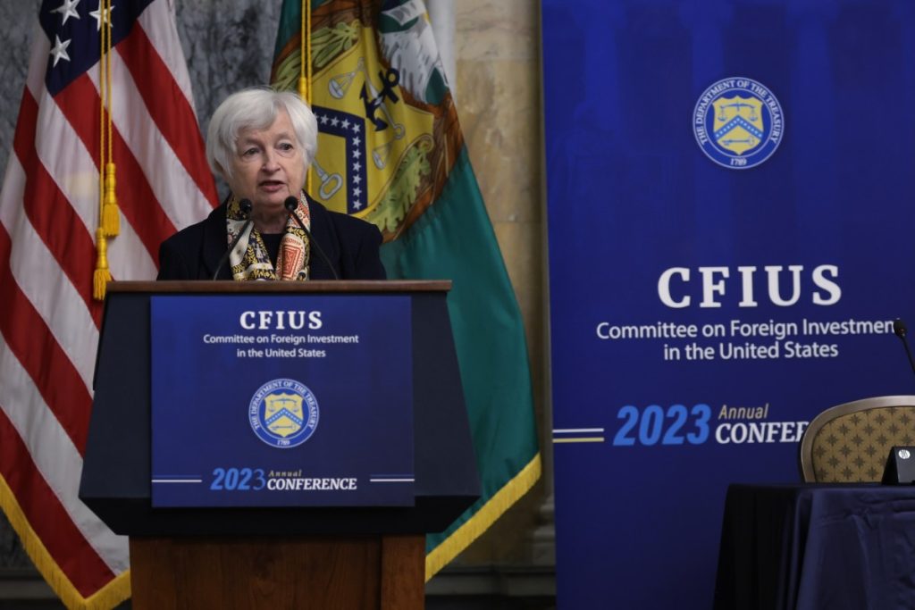 a photo of Treasury secretary Janet Yellen speaking at an event in DC in September 2024 in front of a podium and a banner that reads CFIUS.