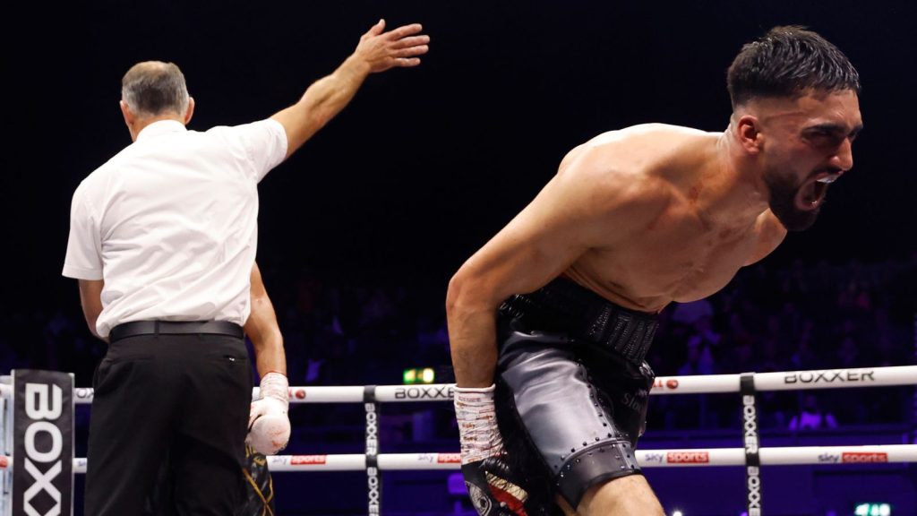 Adam Azim celebrates after beating Sergey Lipinets (pic: Boxxer)