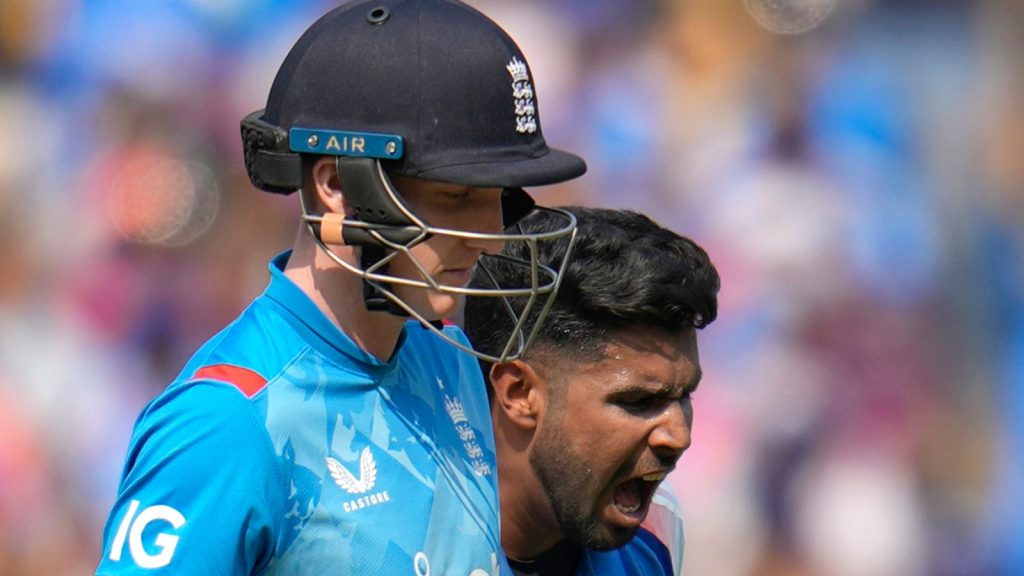 India's Harshit Rana, right, celebrates the dismissal of England's Harry Brook, left, during the first one day international cricket match between India and England at Vidarbha Stadium in Nagpur, India, Thursday, Feb. 6, 2025. (AP Photo/Aijaz Rahi)