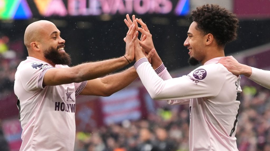 Brentford's Kevin Schade (right) celebrates his goal with Bryan Mbeumo