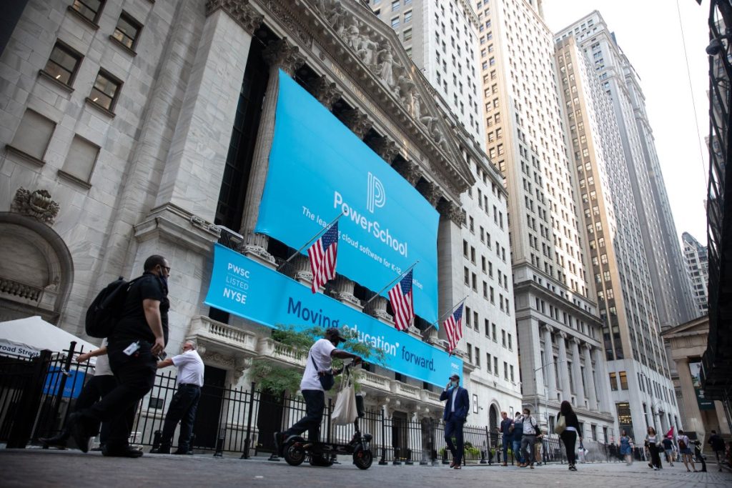 PowerSchool signage during the company's initial public offering, in front of the New York Stock Exchange.