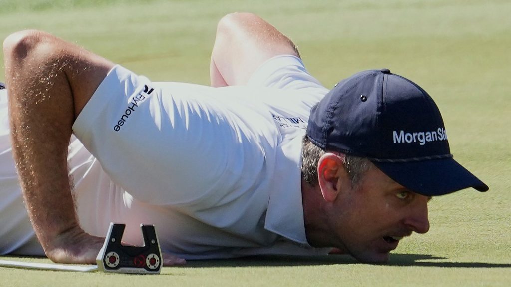 Justin Rose lines up a putt on the eighth hole during the second round at the Masters golf tournament, Friday, April 11, 2025, in Augusta, Ga. (AP Photo/Matt Slocum)