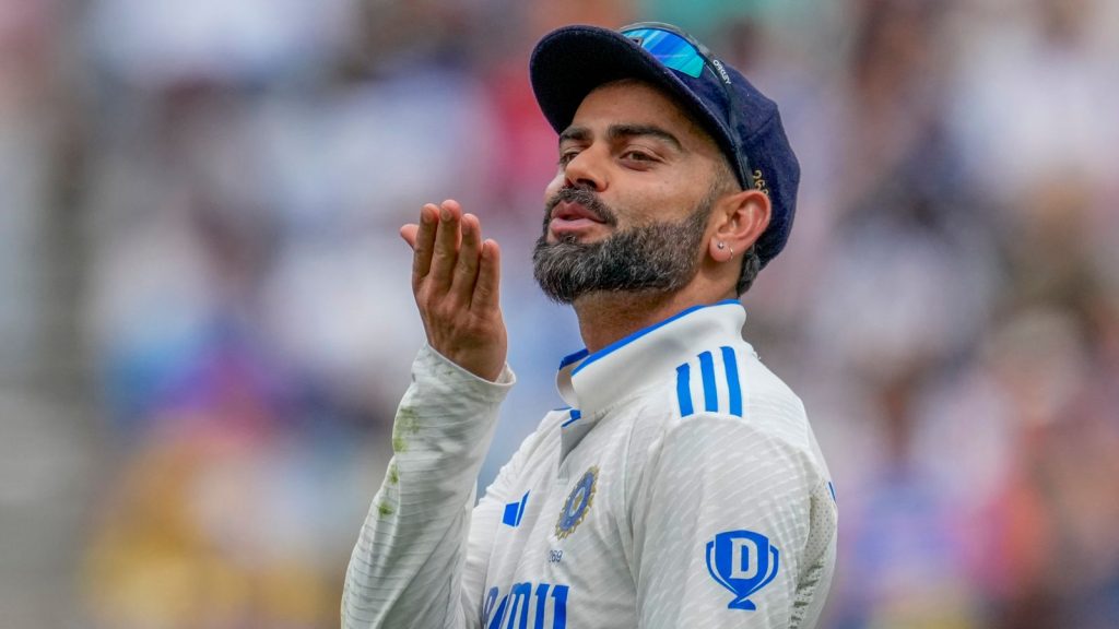 India's Virat Kohli gestures to a member of a crowd during play on the first day of the fourth cricket test between Australia and India at the Melbourne Cricket Ground, Melbourne, Australia, Thursday, Dec. 26, 2024. (AP Photo/Asanka Brendon Ratnayake)